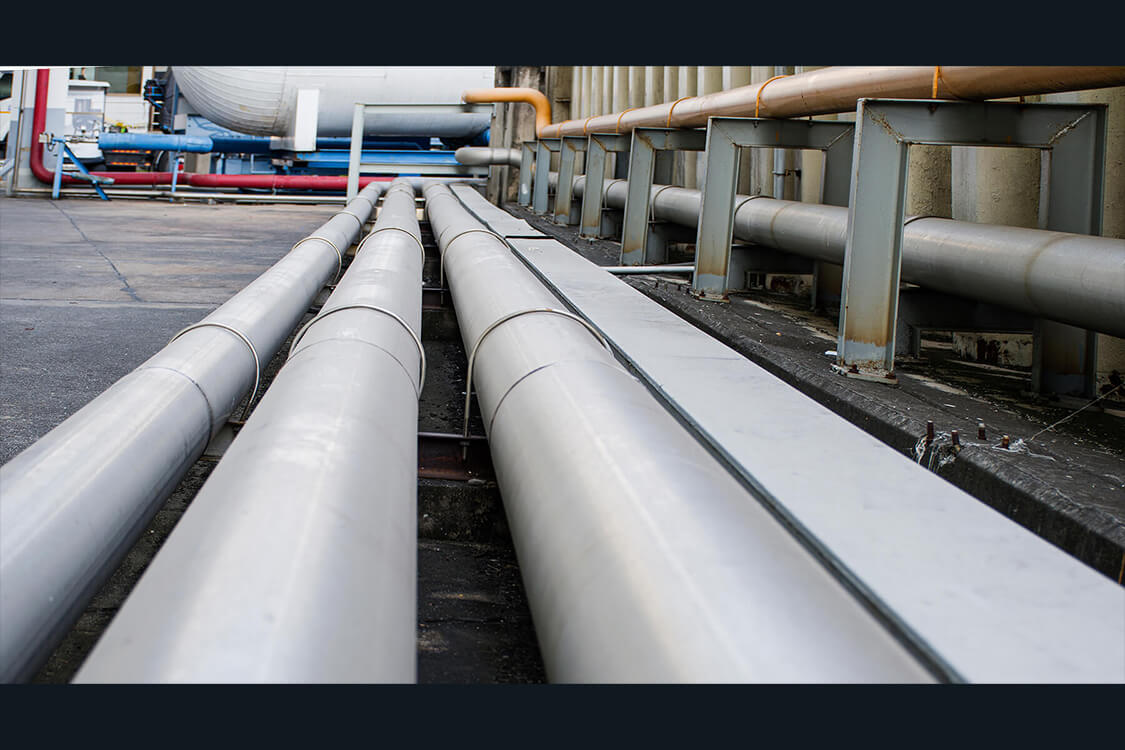 Photo of pipelines lined up in a row.