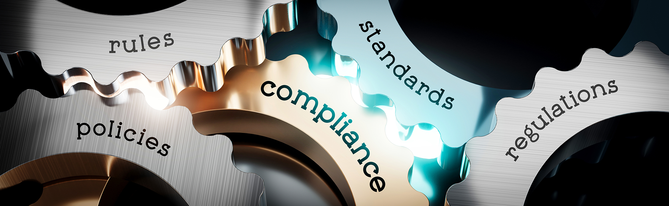Photo of cogwheels with graphics and words like compliance and standards to represent UPI Safety and Quality Services